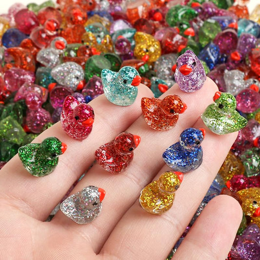 50pcs Mini Resin Ducks Glow in the Dark Glitter Tiny Miniature Figurines Bulk Colored Little Animals Crafts Charms for Fairy Garden Fish Tank Dollhouse Tabletop Decor, Fine Glitter Duck